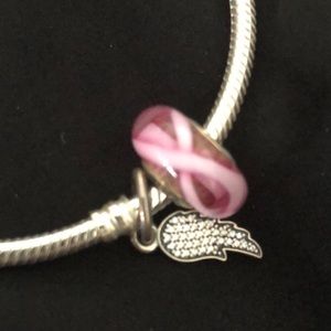Breast cancer charm pandora. New. Never worn.